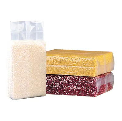 Tasse di imballaggio in plastica di nylon trasparente a basso costo con guarnizione laterale resistente 1 kg/100 kg Tasse di imballaggio a vuoto per alimenti per riso