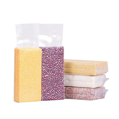Tasse di imballaggio in plastica di nylon trasparente a basso costo con guarnizione laterale resistente 1 kg/100 kg Tasse di imballaggio a vuoto per alimenti per riso